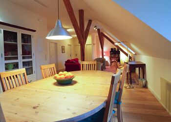 Kitchen with dining table apartment Kutscherwohnung